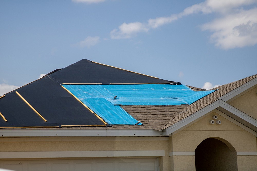 emergency roof repair services on a home in spokane