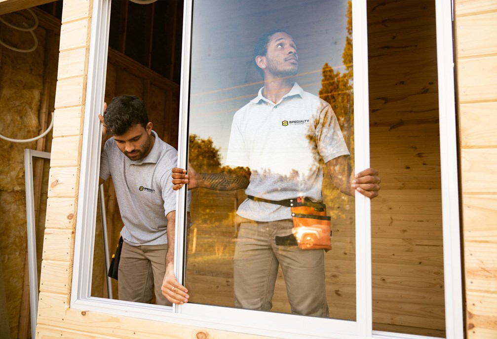 window installers in Rathdrum, ID putting in a window